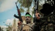 Bewaffnete und maskierte Hamas-Kämpfer (Archivbild) © picture alliance / abaca /ABACA Foto:  Habboub Ramez