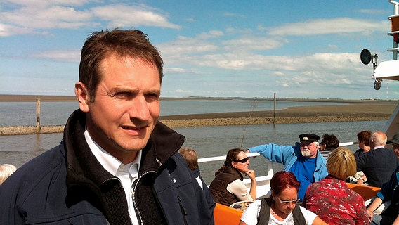 Martin Ullrich ist der Inselmakler. © NDR/Johann Ahrends 