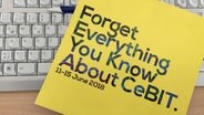 An advertising brochure from CeBit informs about the event in 2018. © Photo by NDR: Sven Glagow