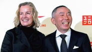 Jil Sander with Tadashi Yanai from Uniqlo. © dpa report Photo: Panasia Taga