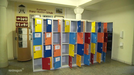 Orphaned lockers in a school hallway.  