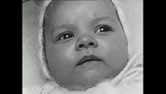 Eine Nahaufnahme von dem Gesicht eines Babys (Archivbild)  