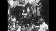 Eine überfüllte Straße in Hongkong (Archivbild)  