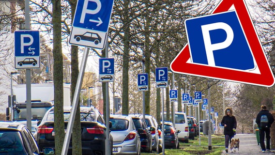 Eine Straße in Hannover mit sehr vielen Schildern.  