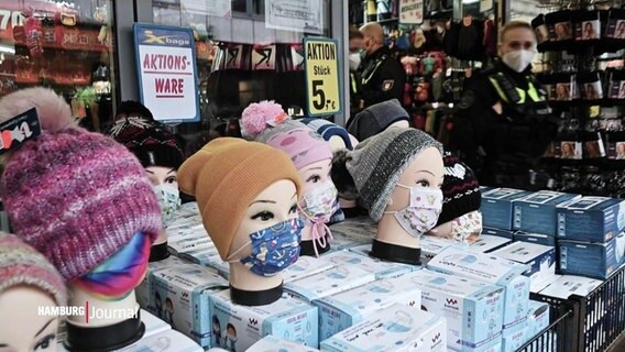 Ein Laden bietet Mund-Nasen-Schutz zum Verkauf an. © Screenshot 