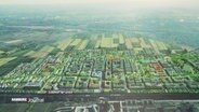 Eine Visualisierung zeigt den geplanten Stadtteil Oberbillwerder aus der Luft. © Screenshot 