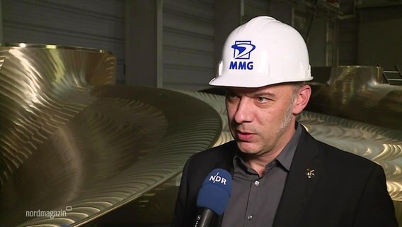 Lars Greitsch, Geschäftsführer des Industriekonzerns MMG Waren, im Interview. © Screenshot 