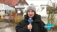 Die Reporterin Elske Beermann berichtet aus Neuharlingersiel. © Screenshot 