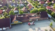 Der eingestürzte Supermarkt in Ratzeburg, aufgenommen aus der Luft. © Screenshot 