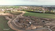 Die Baustelle der Ortsumgehung Wolgast, fotografiert aus der Luft. © Screenshot 