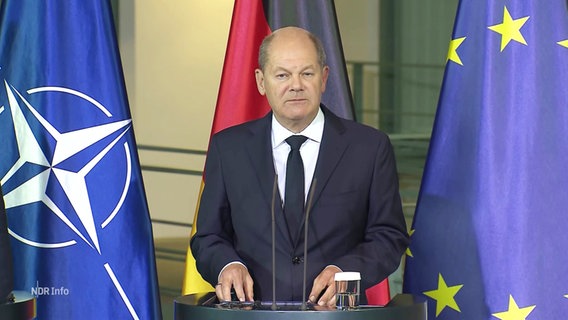 Bundeskanzler Olaf Scholz bei einer Rede © Screenshot 