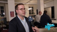 Nicolas Reuß FDP Ortsvorsitzender Ratzeburg im Interview. © Screenshot 