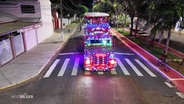 Der "Truck der Freude" in Brasilien an einer Straßenkreuzung. © Screenshot 