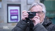 Bernd Reinert fotografiert. © Screenshot 