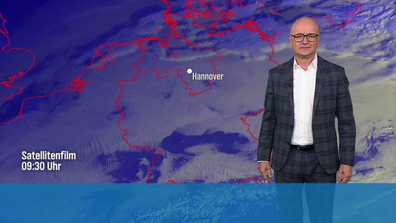 Ein Meteorologe steht vor einer Wettergrafik. © Screenshot 