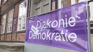 Ein Banner mit der Aufschrift Diakonie Demokratie. © Screenshot 