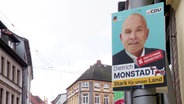 Ein Wahlplakat zeigt den Unions-Kandidaten Dietrich Monstadt. © Screenshot 