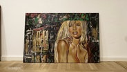 Portrait von Pamela Anderson, gemalt von der Künstlerin Sylvia Vandermeer. © Screenshot 