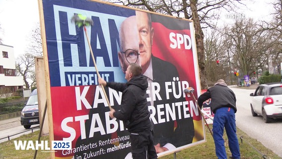 Das Wahlplakat von Olaf Scholz wird mit dem von Peter Tschentscher überklebt. © Screenshot 