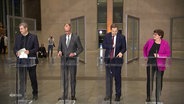 Spitzenpolitiker von CDU und SPD bei einer Pressekonferenz. © Screenshot 