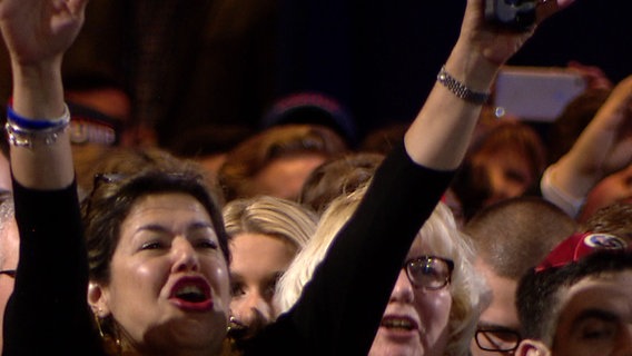 Fan von Donald Trump auf der CPAC-Konferenz © Screenshot 