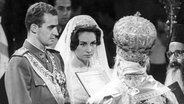 Don Juan Carlos von Asturien und Prinzessin Sophia von Griechenland bei ihrer orthodoxen Trauzeremonie am 14. Mai 1962. © picture-alliance/ dpa | dpa 