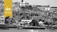 Aden, Steamer Point, mit dem Zollhaus am Kai und dem Hogg Clock Tower auf dem Hügel darüber, um 1950. © IMAGO / United Archives International 