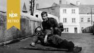 Filmszene mit Michael Hinz in "Die Brücke"von Bernhard Wicki. © IMAGO IMAGES / United Archives 