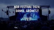 Über dem Bild einer Bühne steht auf einer Texttafel: NDR Festival 2024 - Danke, Grömitz! © NDR Foto: NDR Screenshot