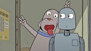 Ein Roboter und ein Hund fotografieren sich in einem Foto-Automat  - Szene aus dem Animationsfilm "Robot Dreams" © Plaion Pictures 