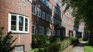 A residential building with red bricks © picture alliance/chromorange Photo: Wolfgang Cezanne