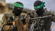 Kämpfer der Ezz al-Din Al-Qassam-Brigaden und des militärischen Flügels der Hamas. © picture alliance/dpa | Abed Rahim Khatib Foto: Abed Rahim Khatib