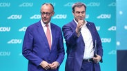 Friedrich Merz und Markus Söder stehen bei einem CDU-Parteitag auf der Bühne. © picture alliance / dts-Agentur | - 