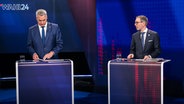 Bundeskanzler Karl Nehammer und FPÖ-Chef Herbert Kickl im Rahmen einer ORF-TV-"Elefantenrunde" mit allen Spitzenkandidaten anlässlich der bevorstehenden Nationalratswahl. © picture alliance/dpa/APA | Georg Hochmuth 