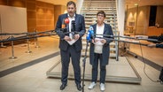 Die Bundesvorsitzenden der SPD Lars Klingbeil und Saskia Esken geben ein Pressestatement. © Michael Kappeler/dpa 