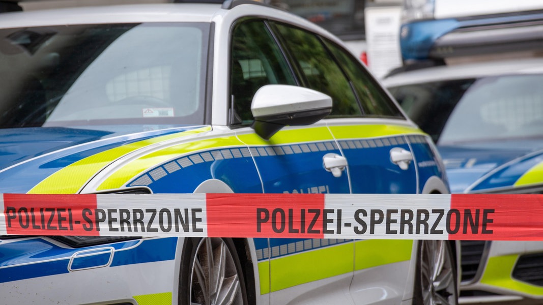 Polizeiwagen und Absperrband, Polizei Symbol