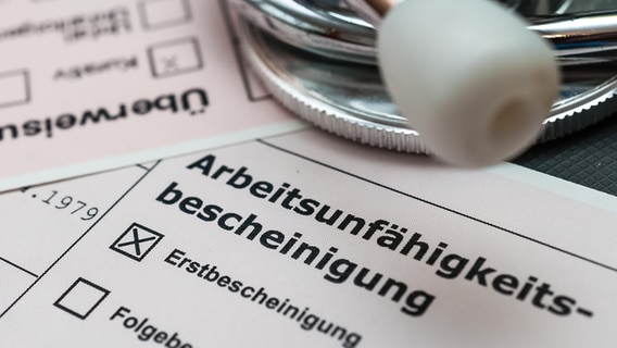 Ein Krankenschein in Nahaufnahme. © Picture Alliance 