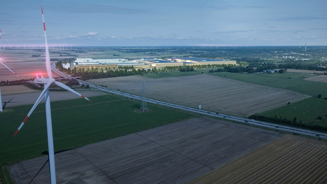 Ein computergeneriertes Bild zeigt die künftige Batteriefabrik von Northvolt bei Heide im Dämmerungslicht.