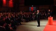 Lübeck: Olaf Scholz (SPD), Bundeskanzler, spricht bei einer Townhall seiner Partei in der Kulturwerft. © dpa Foto: Georg Wendt