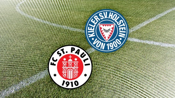 Das Vereinswappen vom FC St. Pauli neben dem von Holstein Kiel vor Fussballrasen. © NDR 