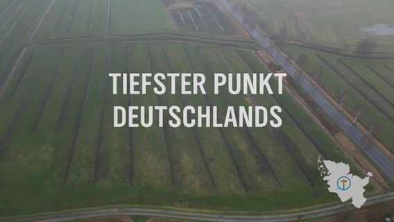 Über einer Luftbildaufnahme ist der Text "Tiefster Punkt Deutschlands" eingeblendet © NDR Foto: NDR Screenshot