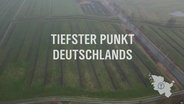 Über einer Luftbildaufnahme ist der Text "Tiefster Punkt Deutschlands" eingeblendet © NDR Foto: NDR Screenshot