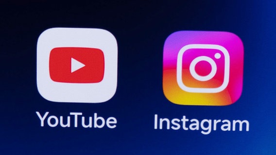 Icon von Instagram und YouTube auf einem Handy-Screen. © Picture Alliance Foto: CFOTO