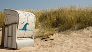 Strandkorb an der Düne. © Colourbox Foto: #335064