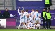 Rostocks Spieler bejubeln einen Treffer © Imago Images 