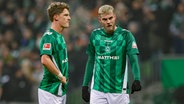 Marvin Ducksch (r.) und Jens Stage von Werder Bremen sind enttäuscht © IMAGO/DeFodi Images Foto: Marco Steinbrenner