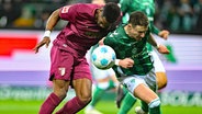 Werder-Kapitän Marco Friedl (r.) im Zweikampf © IMAGO/nordphoto Foto: Kokenge