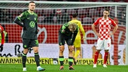 Enttäuschung bei den Spielern des VfL Wolfsburg © IMAGO/Jan Huebner Foto: Patrick Scheiber