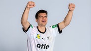 Handball-Nationalspieler Renars Uscins beim Fotoshooting vor der WM © IMAGO / wolf-sportfoto 